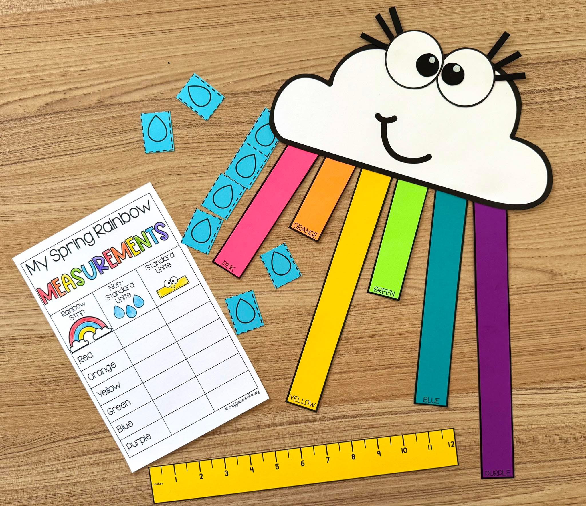 Rainbow measurement craft with colorful strips and a recording sheet.
